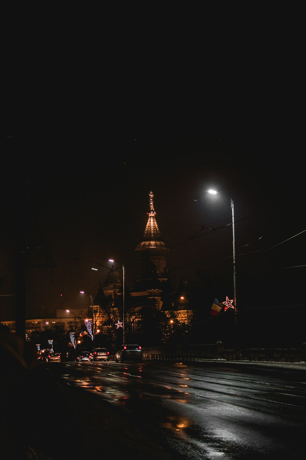 cars on road at night time