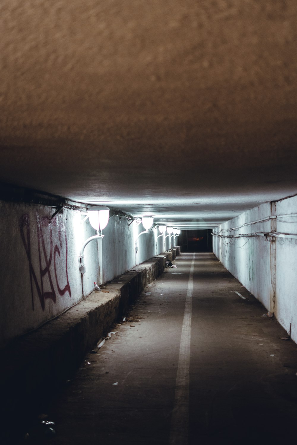 brown concrete hallway