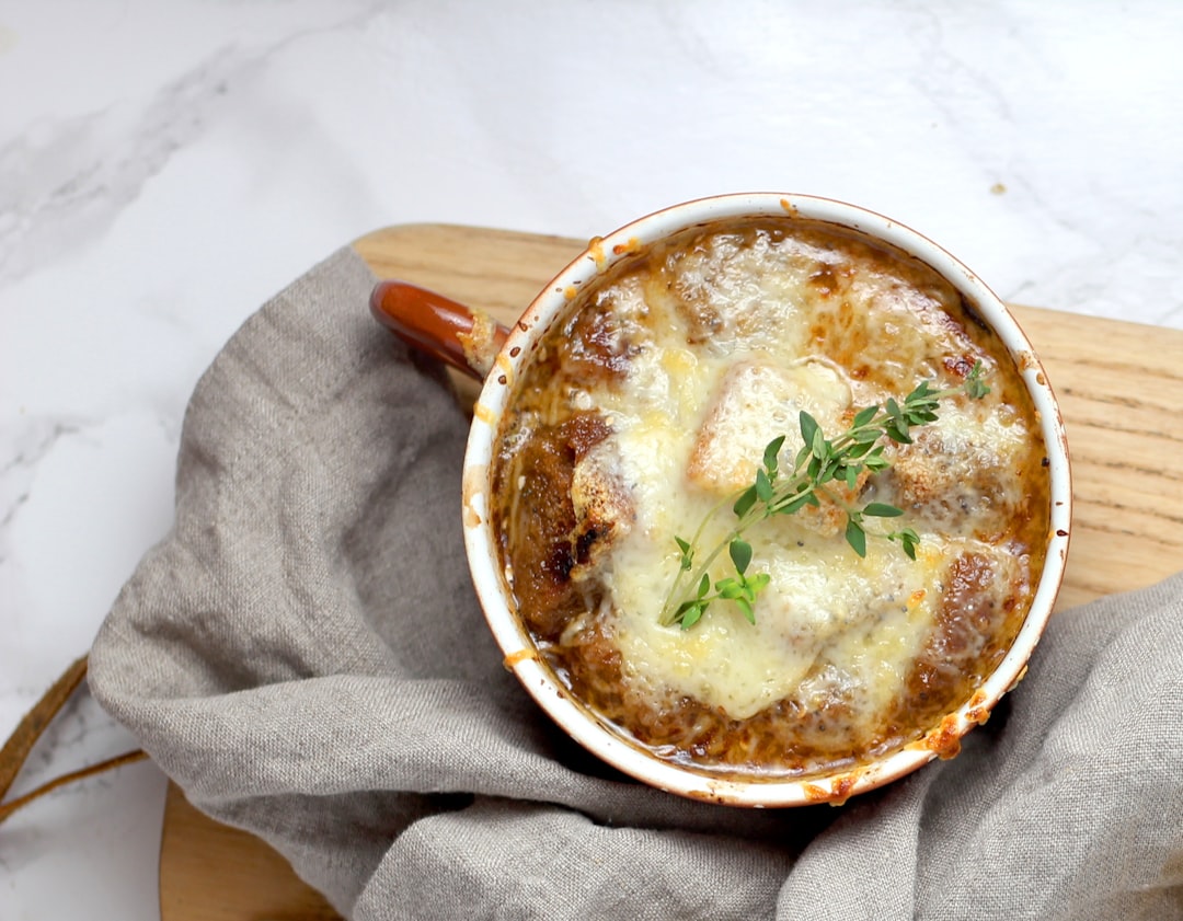 soup with green leaf in teacup, French Onion Soup with Everything Croutons