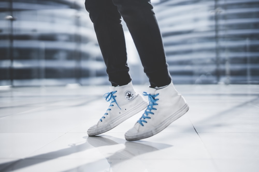 person wearing white Converse All Star high-tops photo – Free Grey Image on  Unsplash