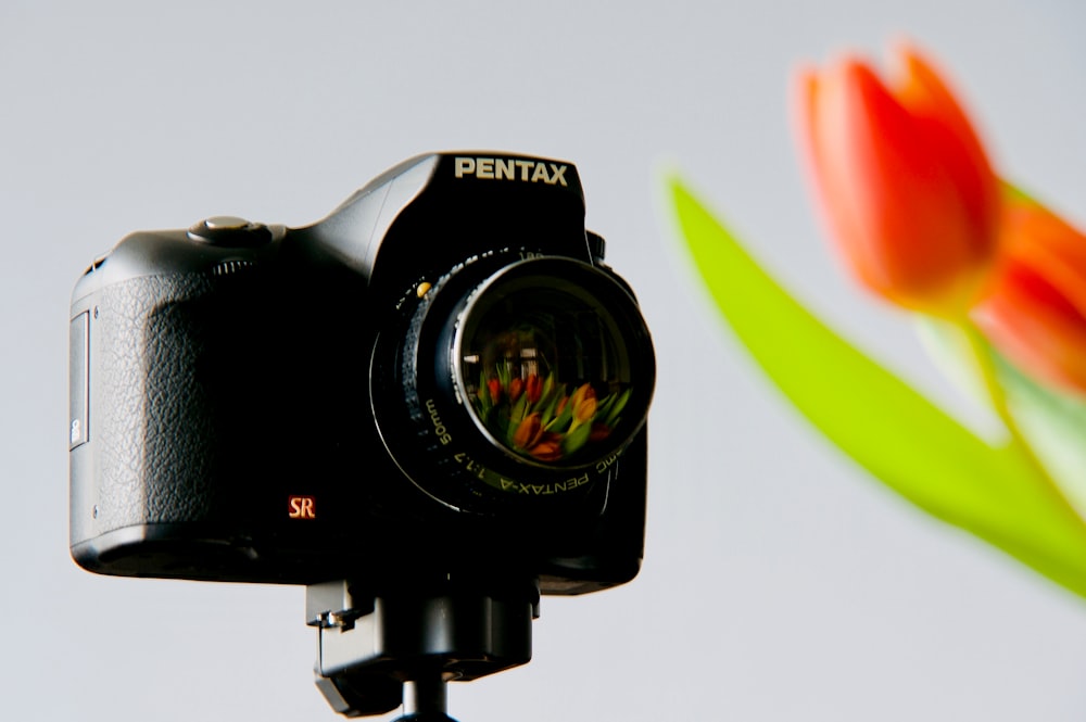 black Pentax DSLR camera