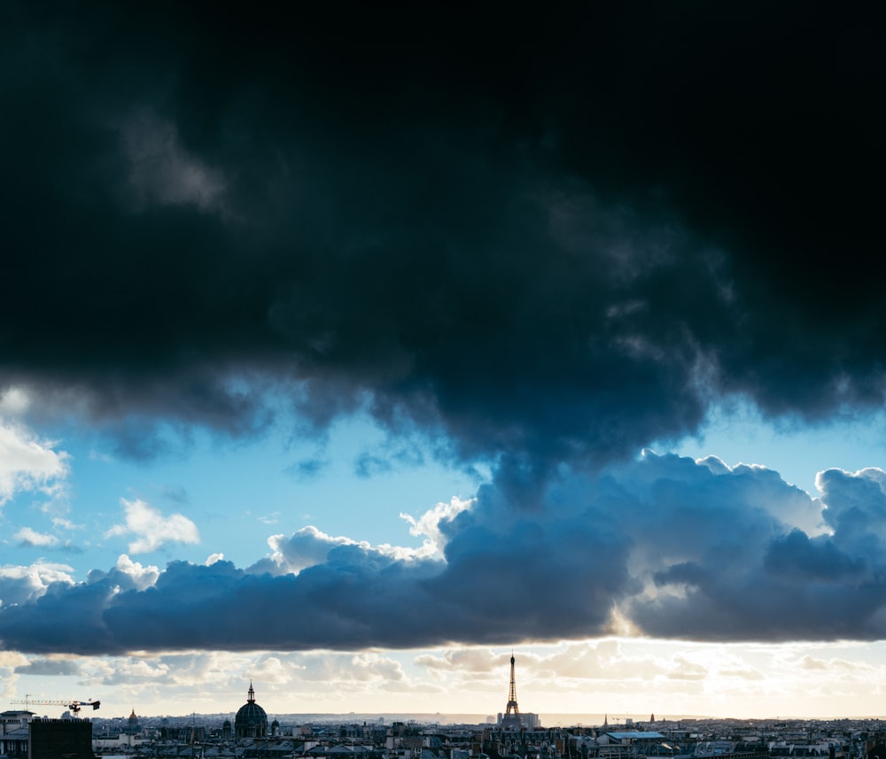 a view of a city under a cloudy sky