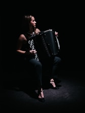 woman playing accordion
