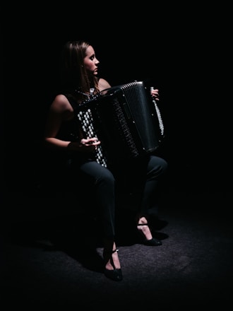 woman playing accordion