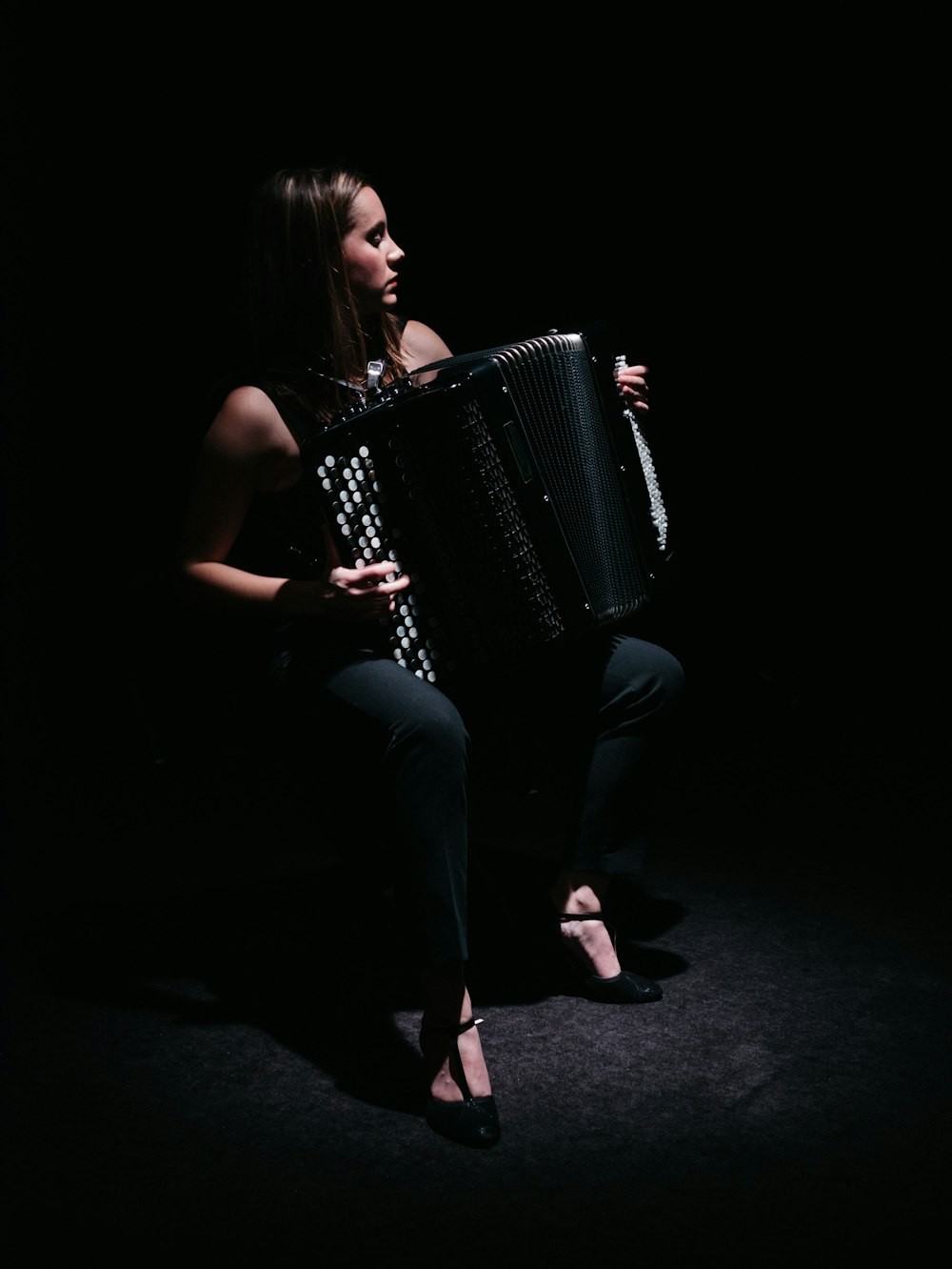 woman playing accordion