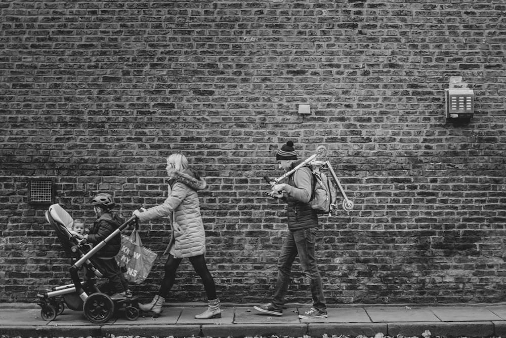 grayscale photo of man and woman