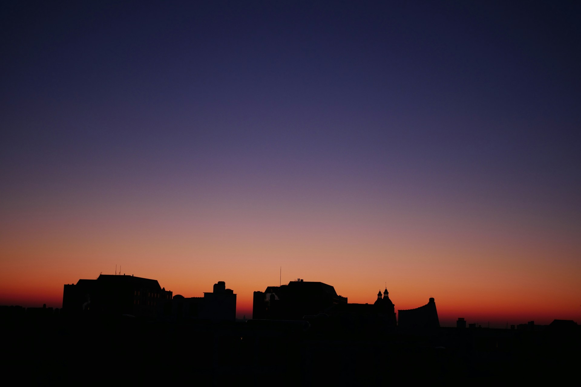 black and brown leather padded tub sofa