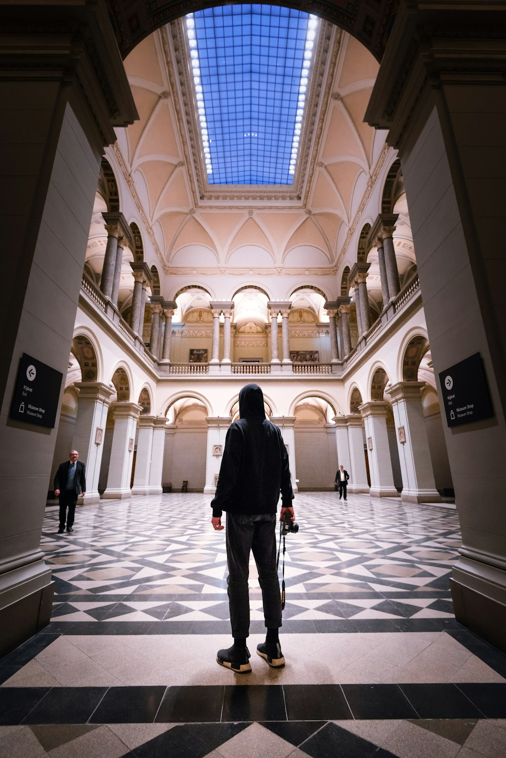 person standing on building lobby