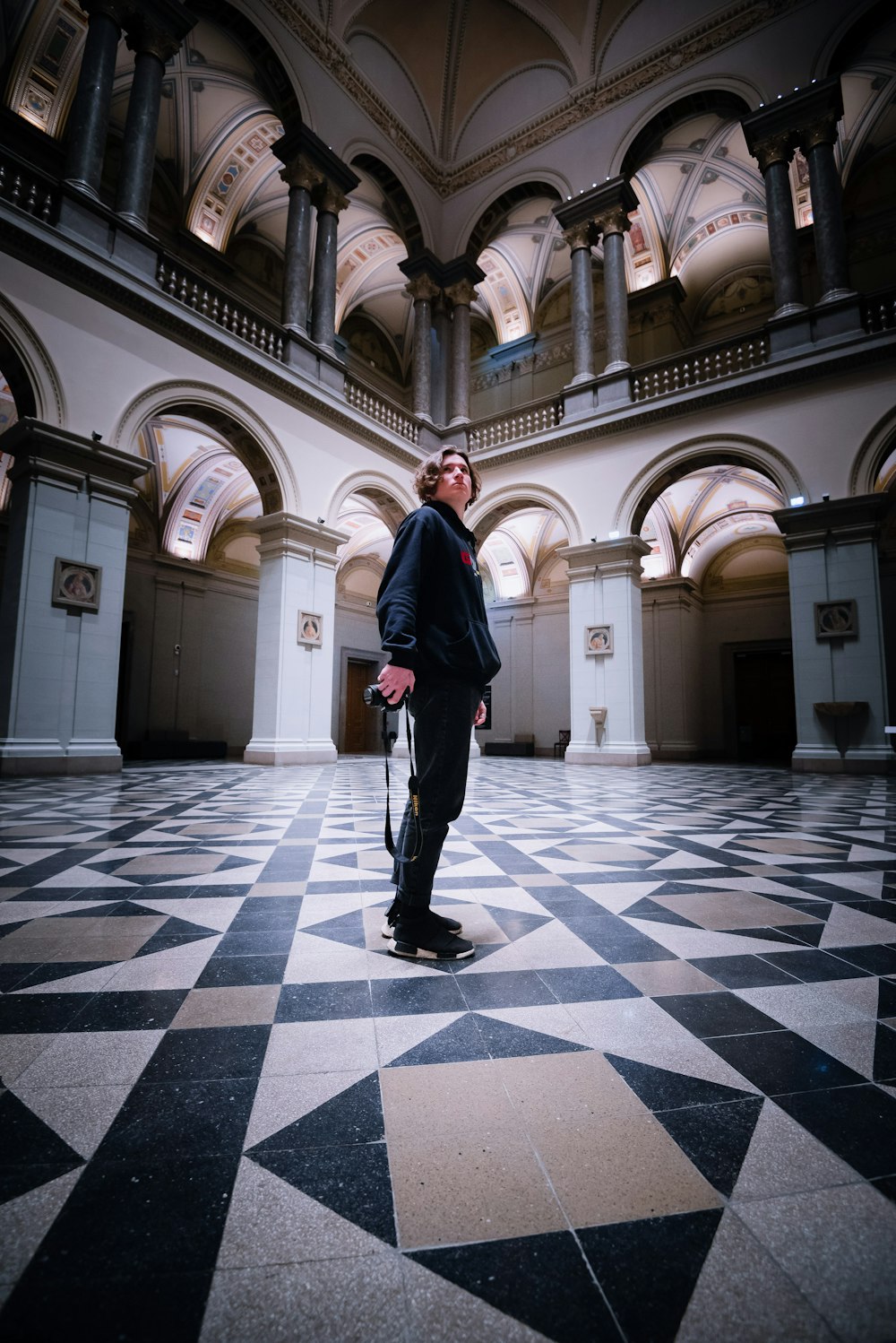 man standing inside hall