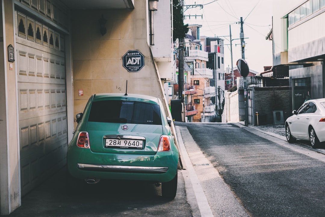 parked green car,