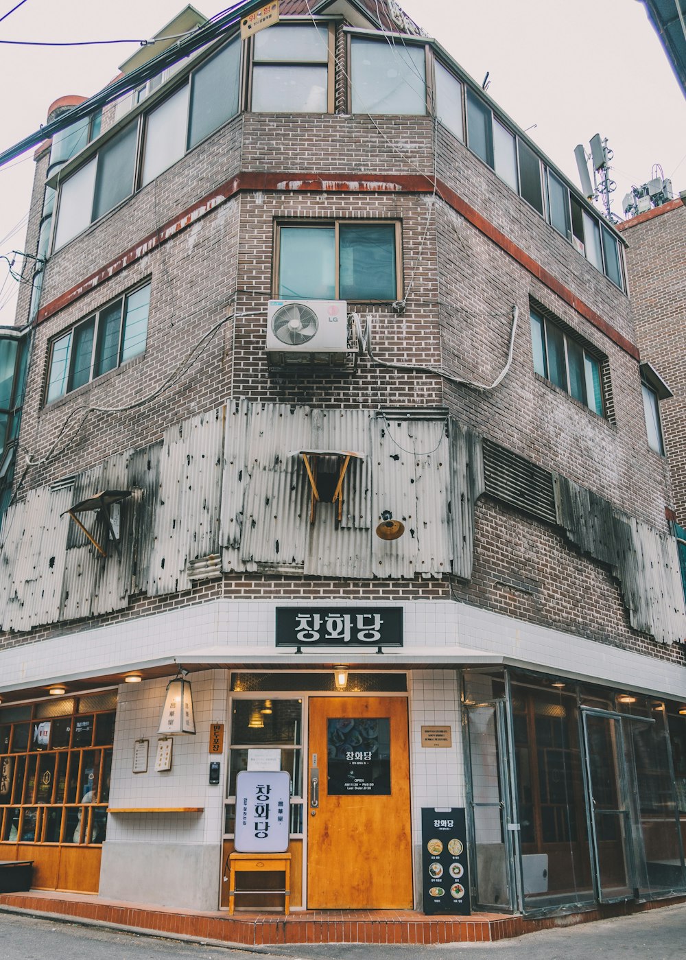 gray and orange concrete house during daytime