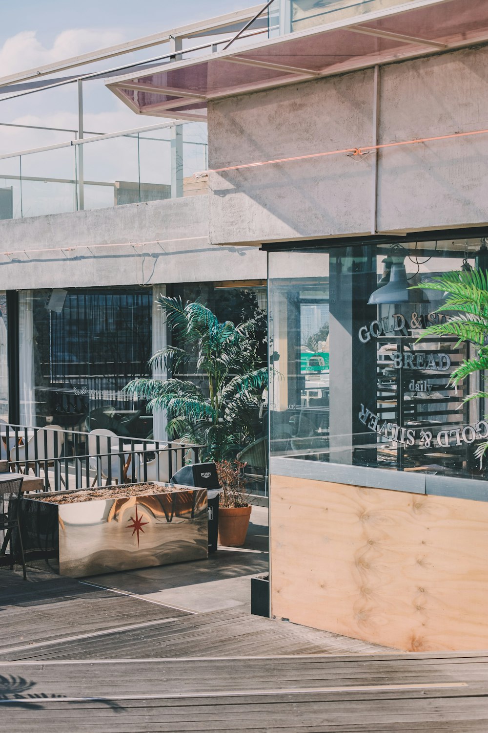 dining table set outside building with no people during daytime