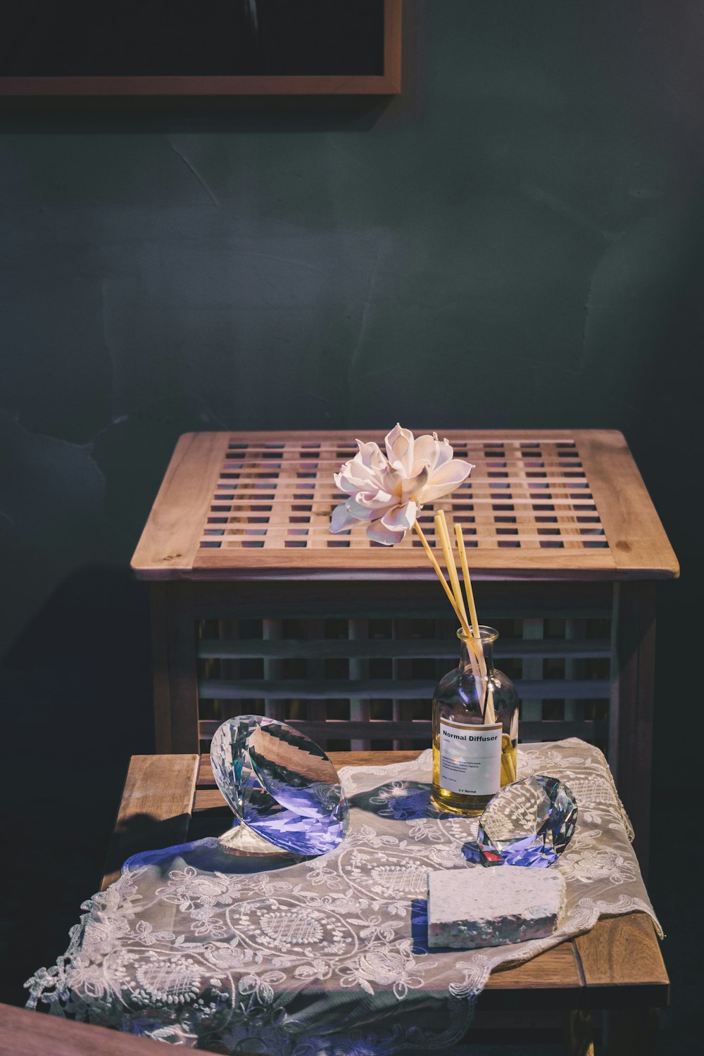 white petaled flower near table