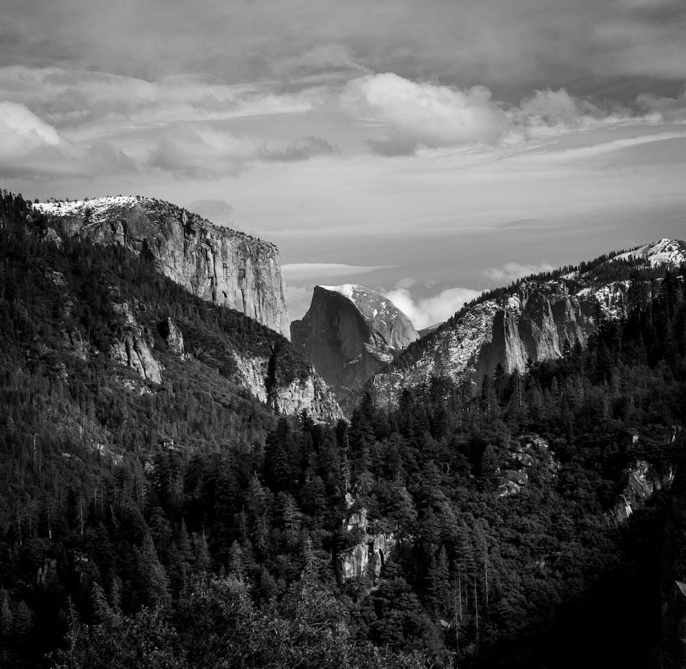 grayscale photo of snow covered mountains