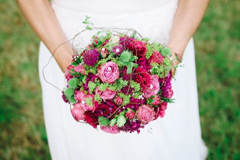 pink and purple petaled flowers bouquet