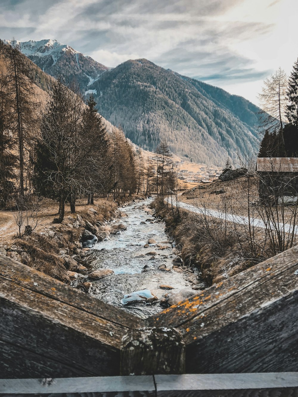 body of water with mountain background