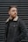 man wearing black denim jacket