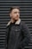 man wearing black denim jacket