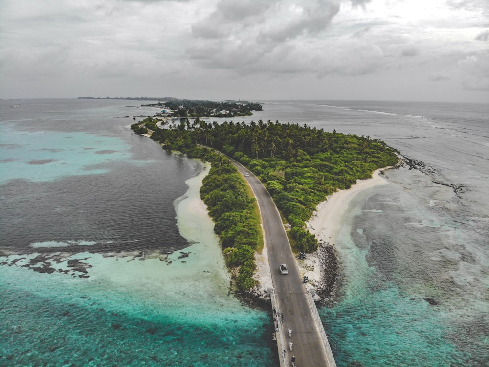 aerial view photography of road beside ocean