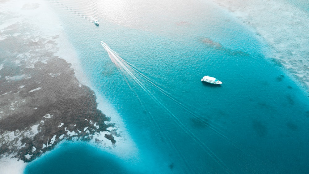 aerial view photography of white boat