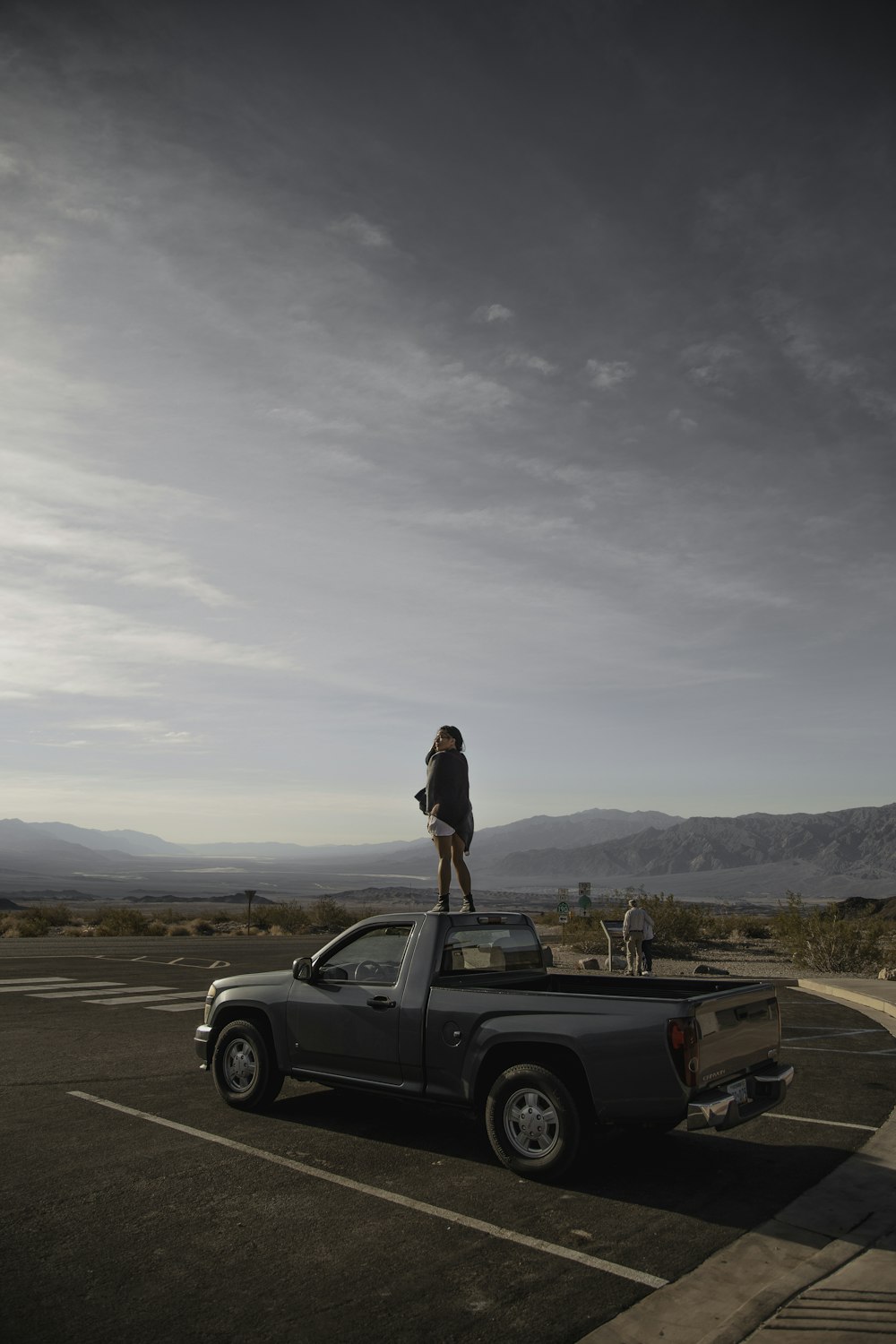 person standing on top of vehicle outdoor