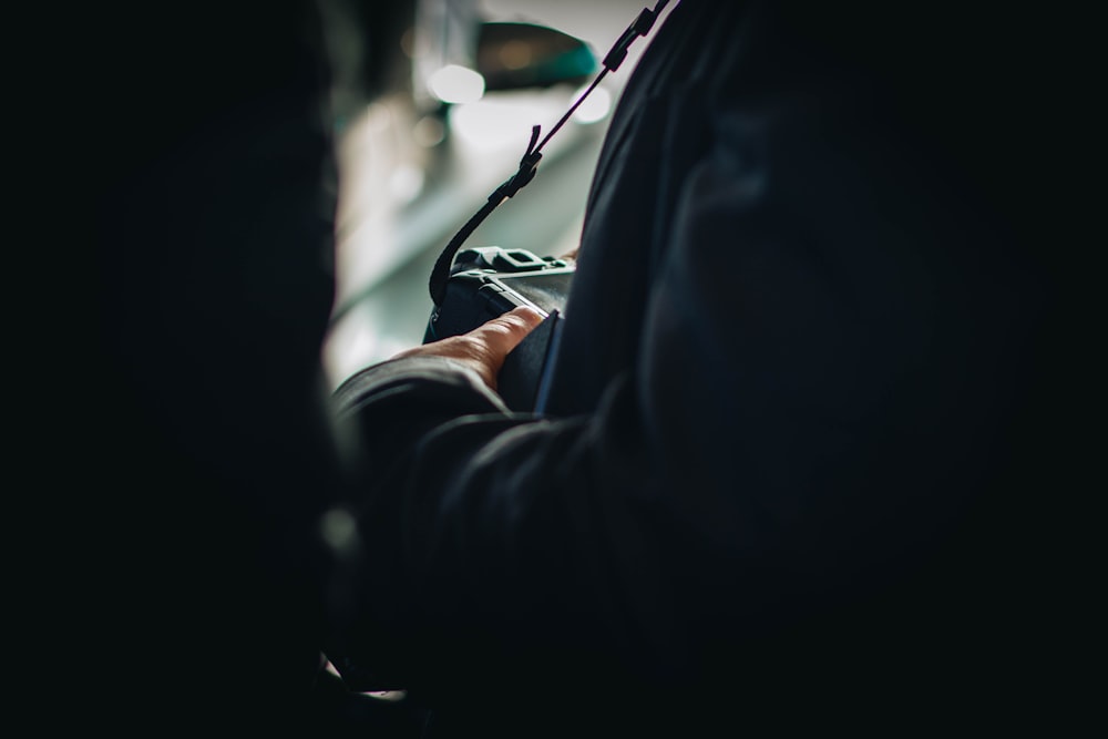 person wearing black jacket