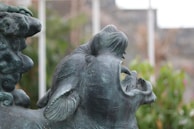 Intricate 3D model of a mythical beast with sharp horns and textured fur against a misty background