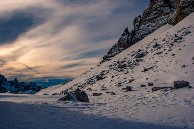 A rugged mountain landscape at dawn symbolizing strength and new beginnings.