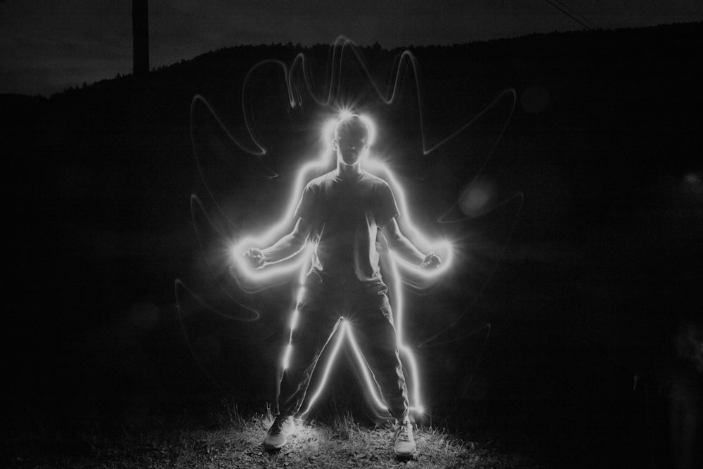 person with neon light signage