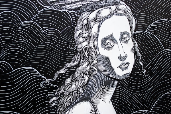 Detailed ink artwork with flowing black lines on white background