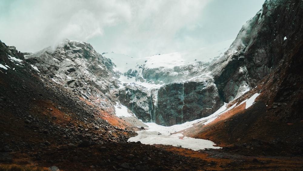 gray mountain filled with snow