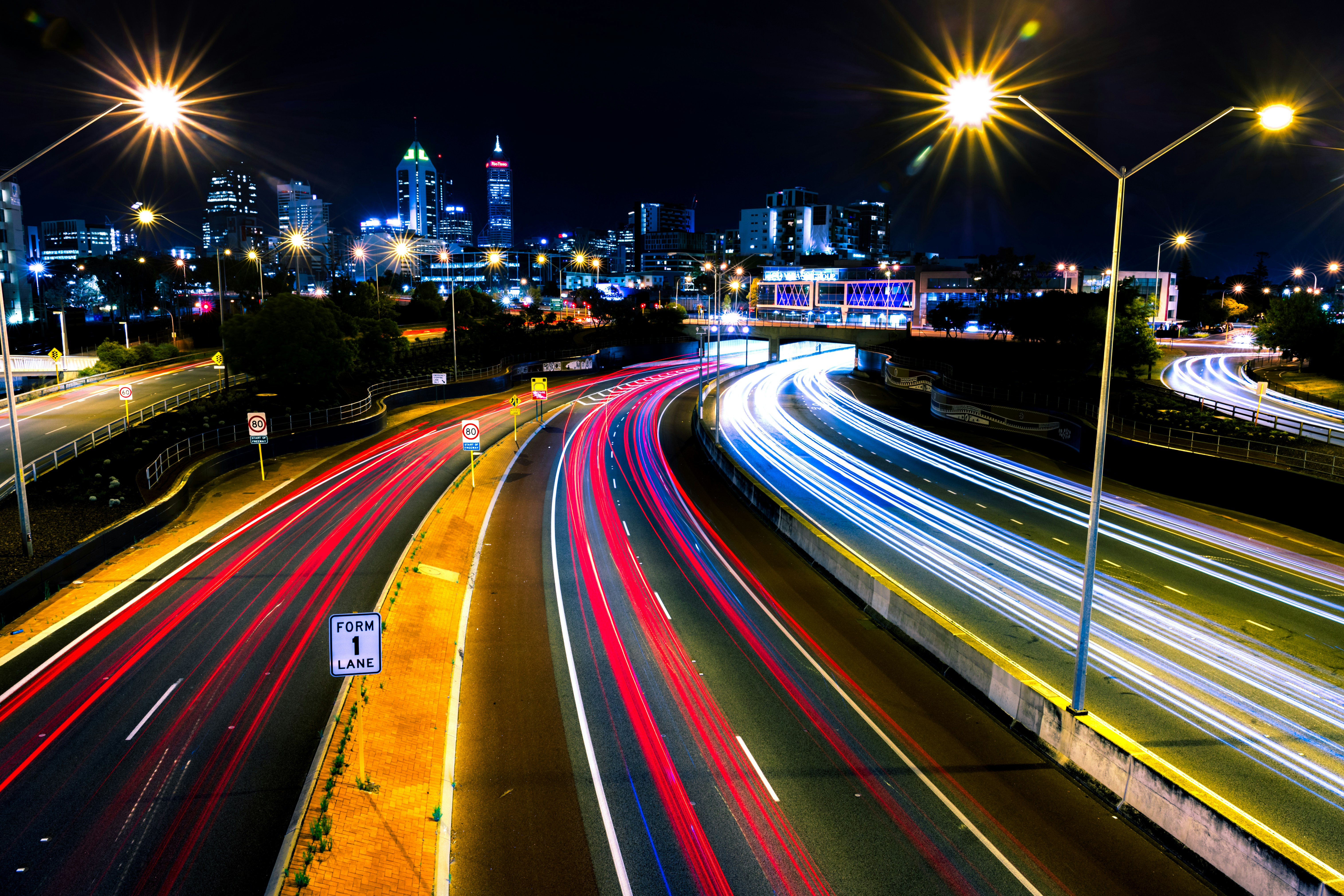 time lapse photography of road at night
