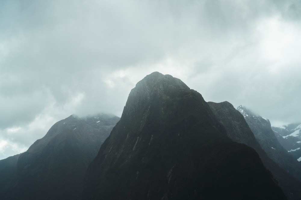 brown mountain under white sky during daytime