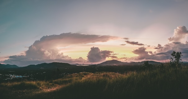A cinematic view of a lush Peruvian landscape at sunset.