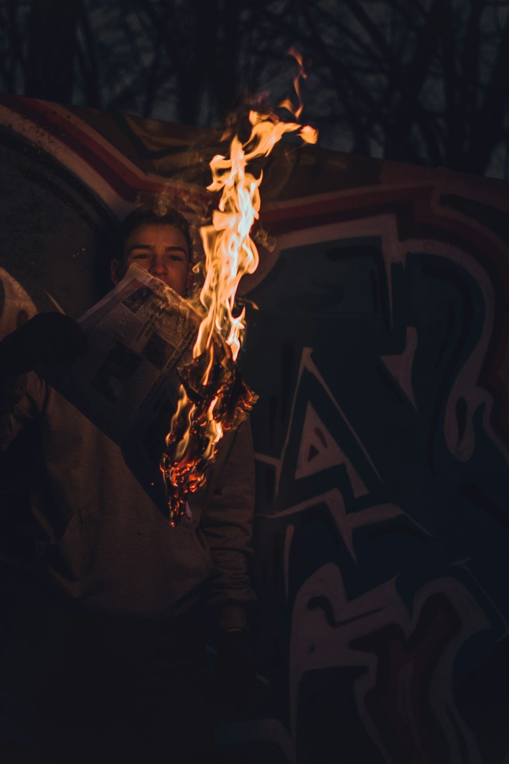 man burning printer paper