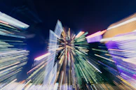 A dynamic cityscape rendered in sweeping lines and contrasting tones, reflecting urban energy.