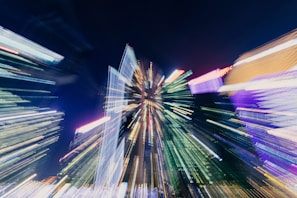 An artistic representation of a cityscape filled with dynamic colors and perspectives.