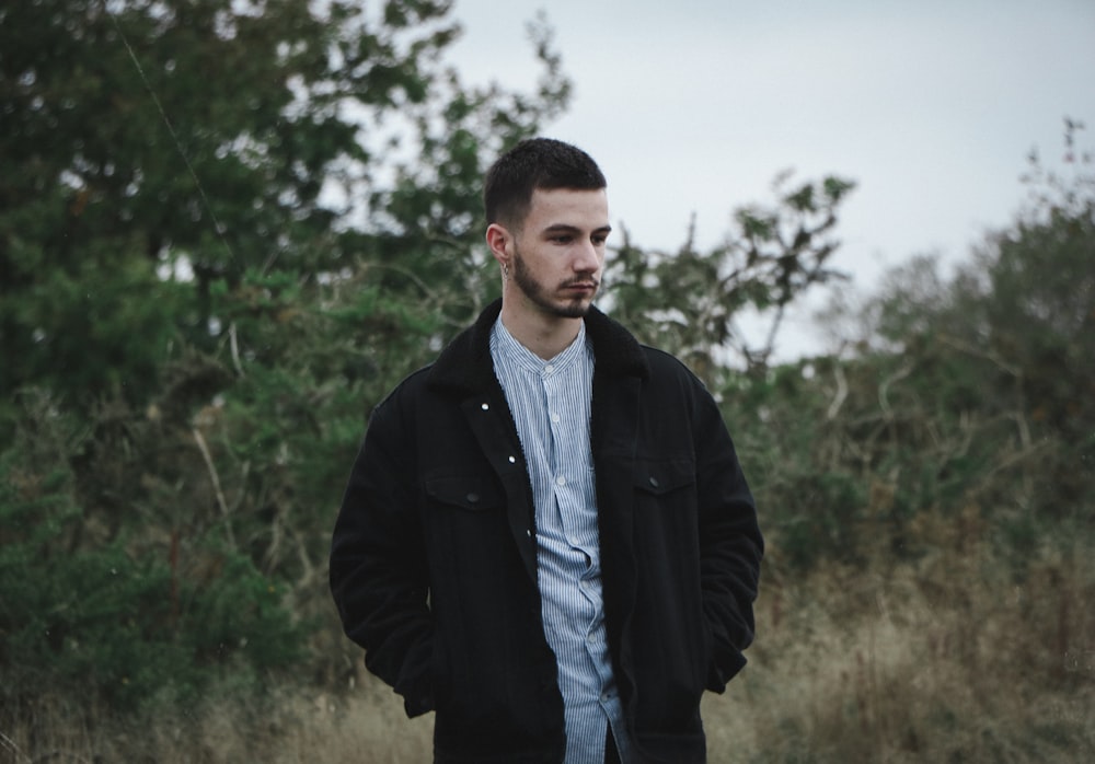 man wearing black jacket