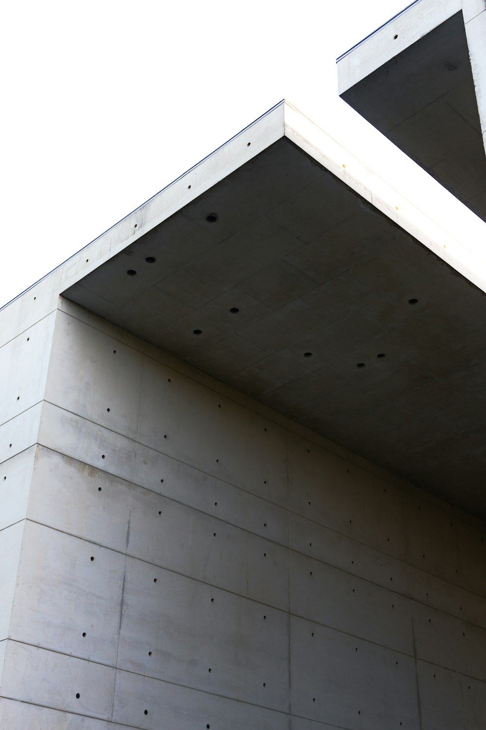 white concrete wall and ceiling