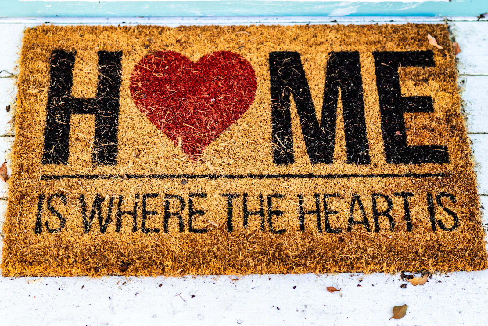 A welcome doormat by a front door — the world's most obvious hiding spot, and a fair metaphor for the API key baked straight into an app's network traffic.