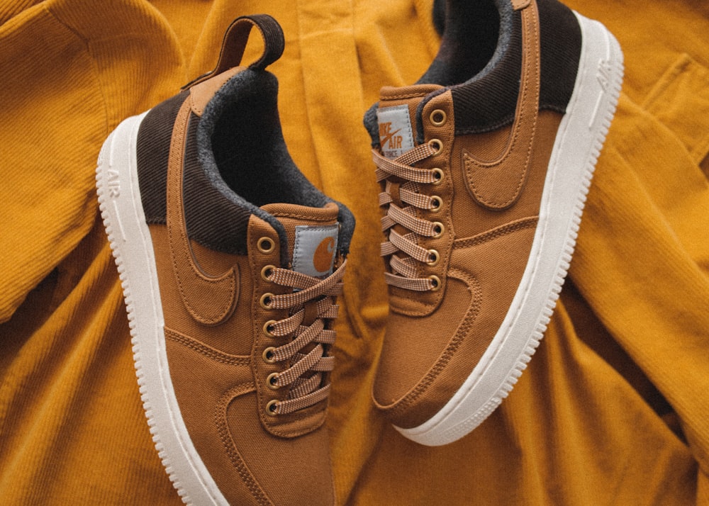 pair of brown Nike Air shoes