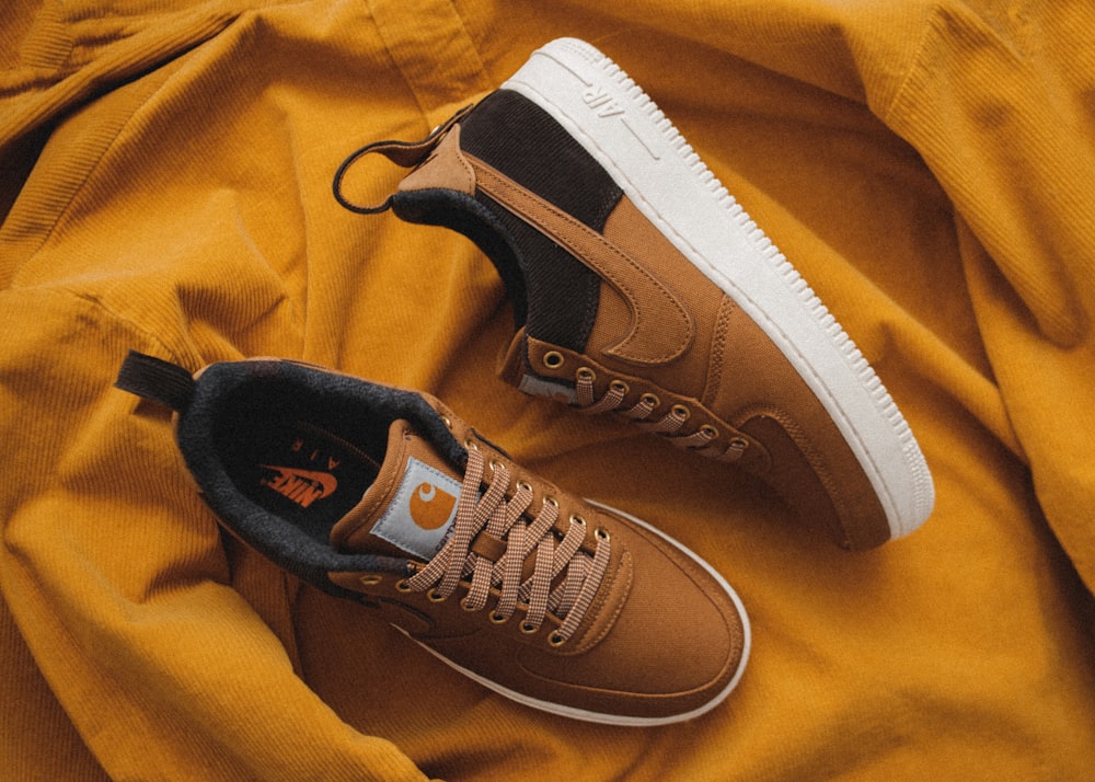 Pair of Carhartt x Nike Air Force 1 shoes photo – Free Sneaker Image on  Unsplash