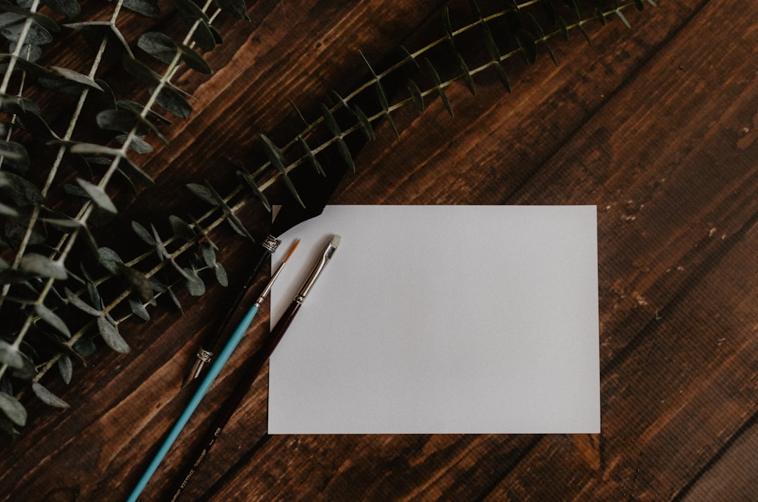 handwritten thank you letter on wooden table