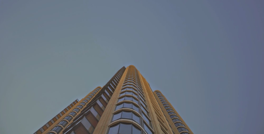 low angle photography of brown high-rise building