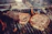 Close-up of perfectly seared steaks sizzling on a Kamado Joe Classic II grill.