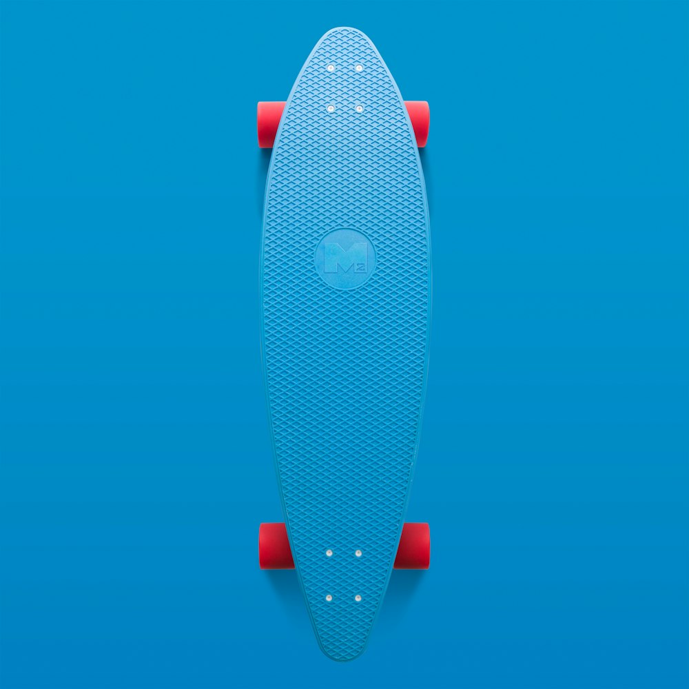 blue and orange longboard