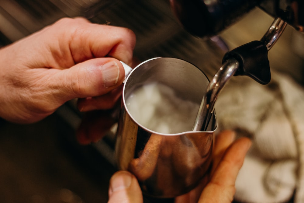 selective focus photography of gray container