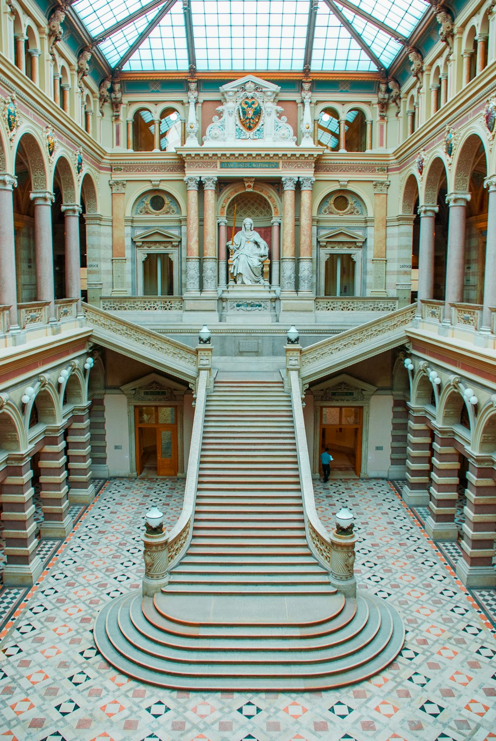 top-view angle photography of white-and-brown concrete building interior