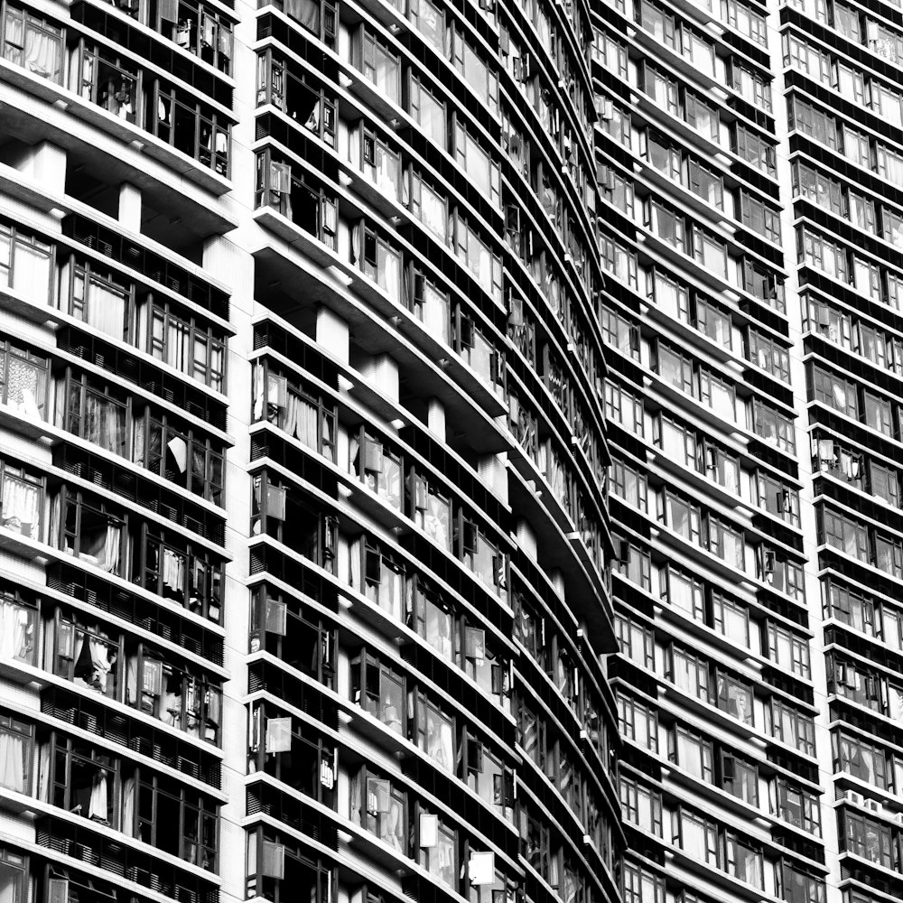 grey multi-storey concrete building during daytime