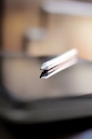 Close-up of a sleek stylus pen on a digital tablet.